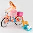 Кукла на велосипеде с собачками