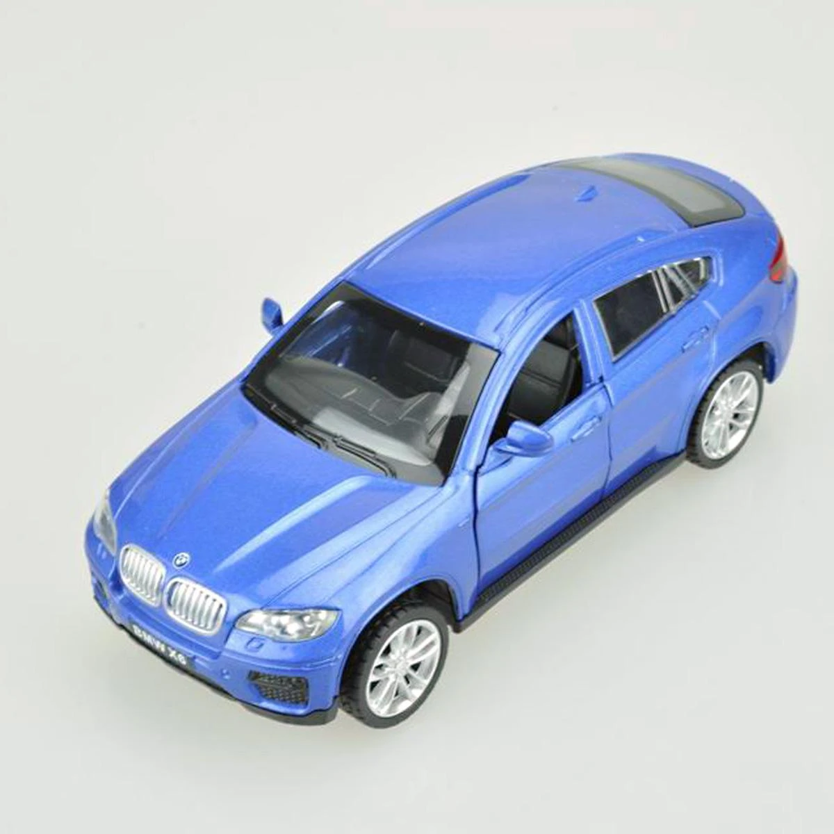 Машина металлическая 1:43 BMW X6. Дв.Откр., цв.син., инерц. 58012